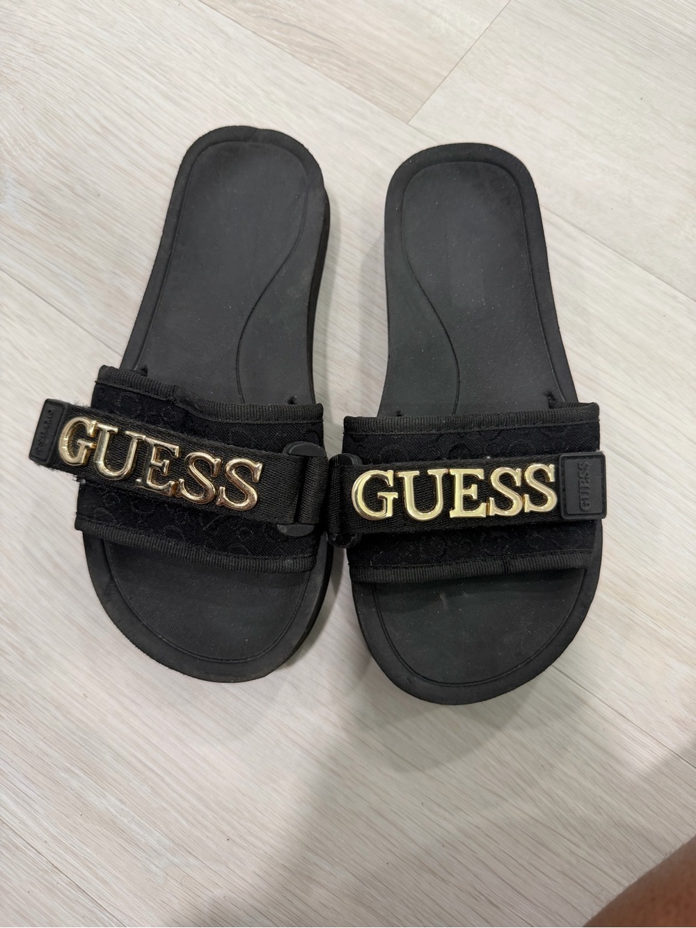GUESS Black Slide Sandals with Gold Logo Accent
